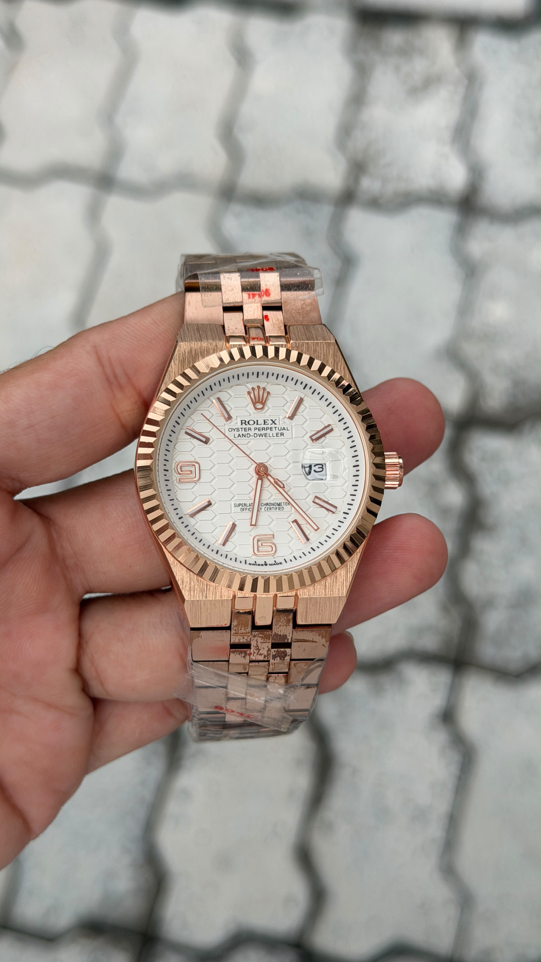 Rolex Oyster Perpetual Land-Dweller Rose Gold White Dial Watch