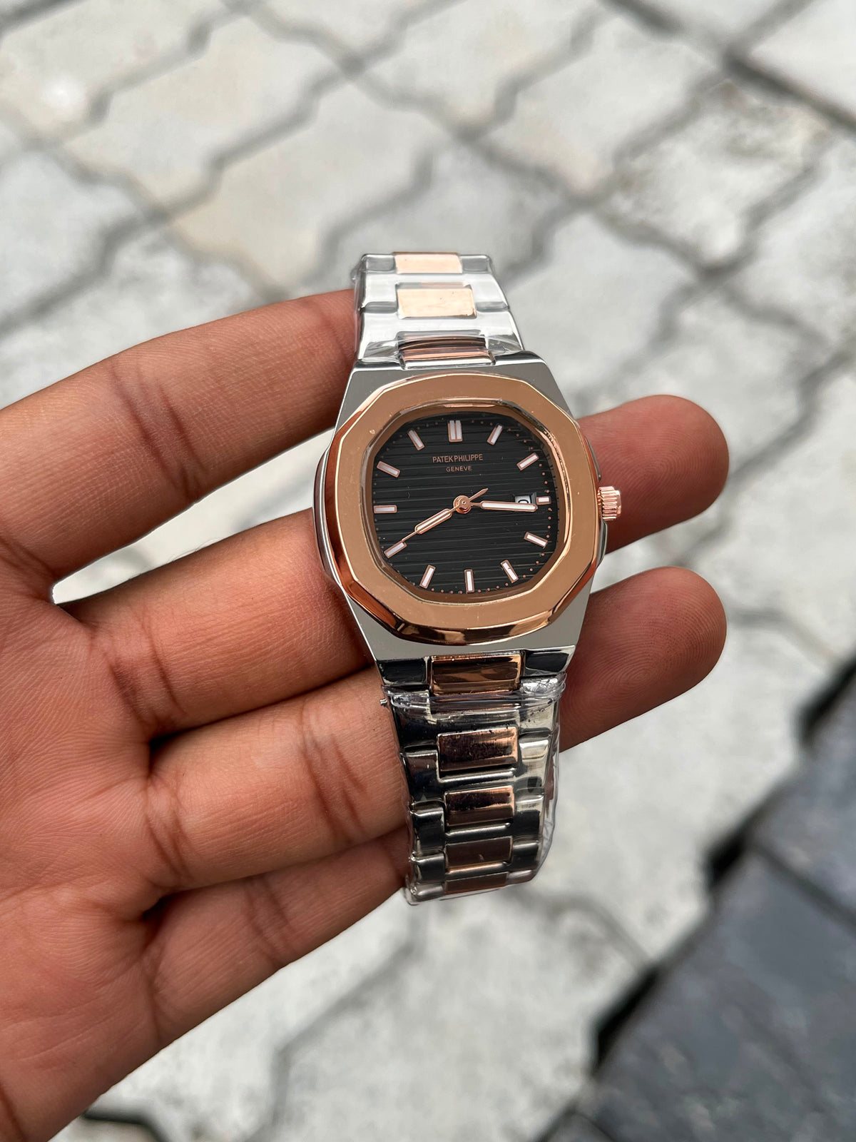 Patek Philippe Black Dial Two-Tone Rose Gold Stainless Steel Nautilus Watch